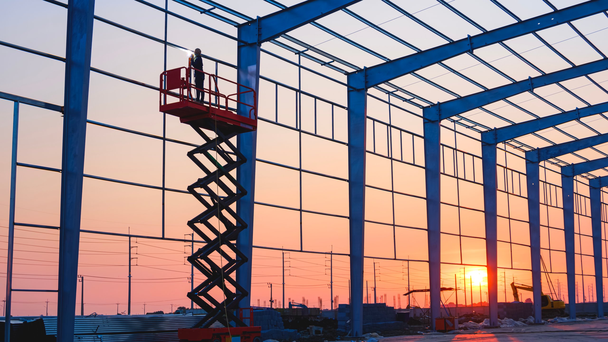 Welding worker on construction site