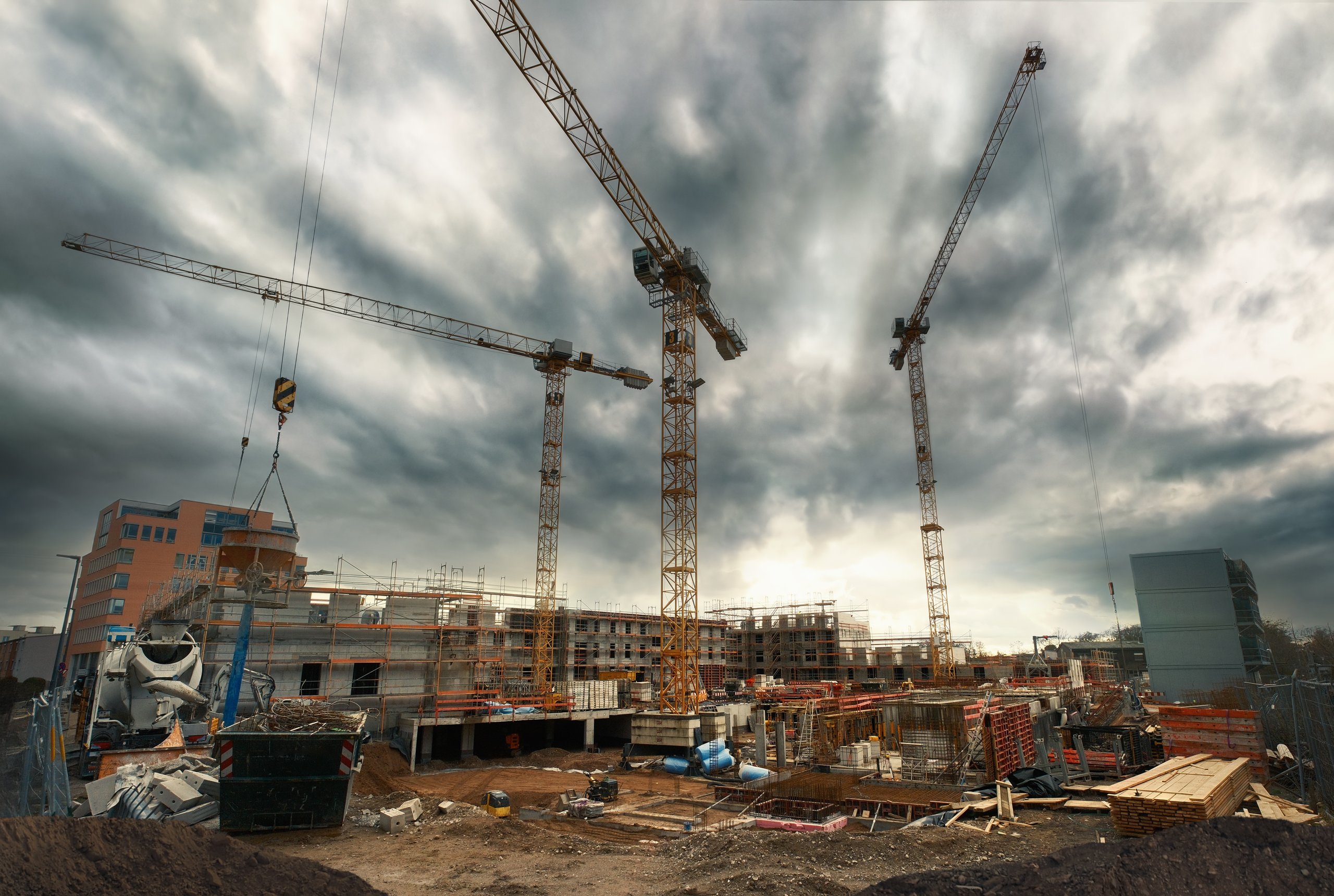 Dramatic construction site with cranes