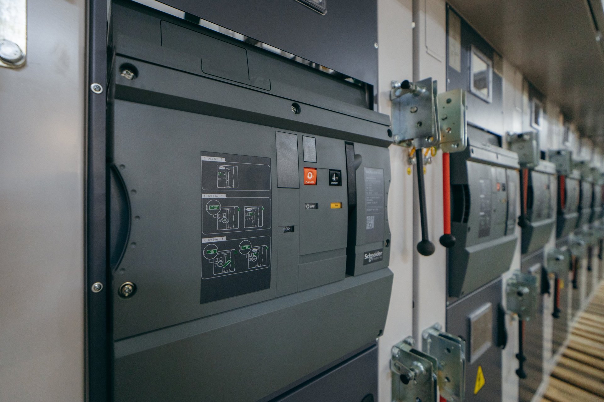Electrical switchgear panels in industrial facility